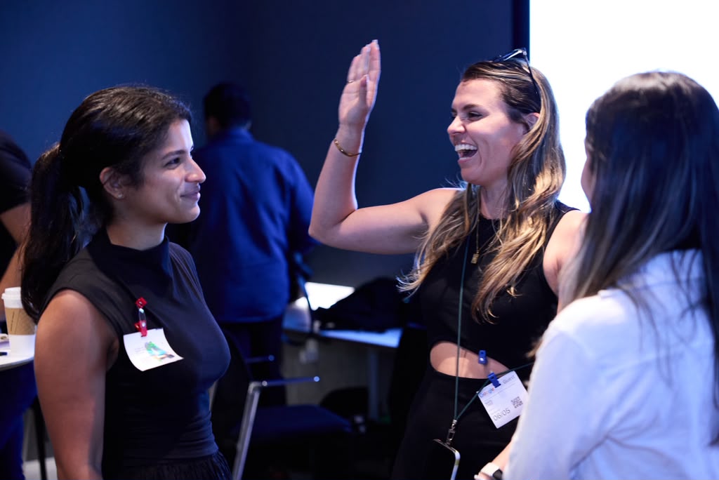 Conference attendees exploring the Latino tech ecosystem